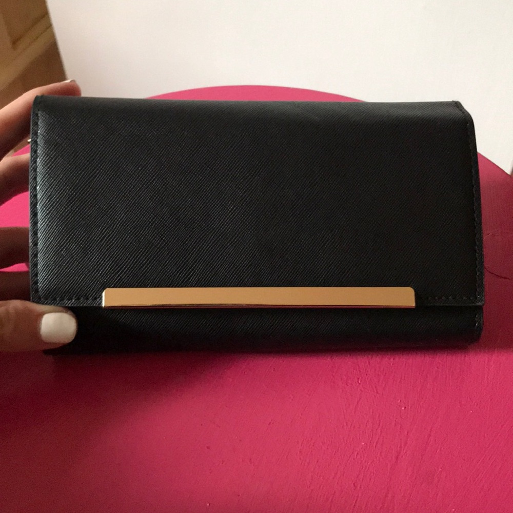 Black clutch with gold detail